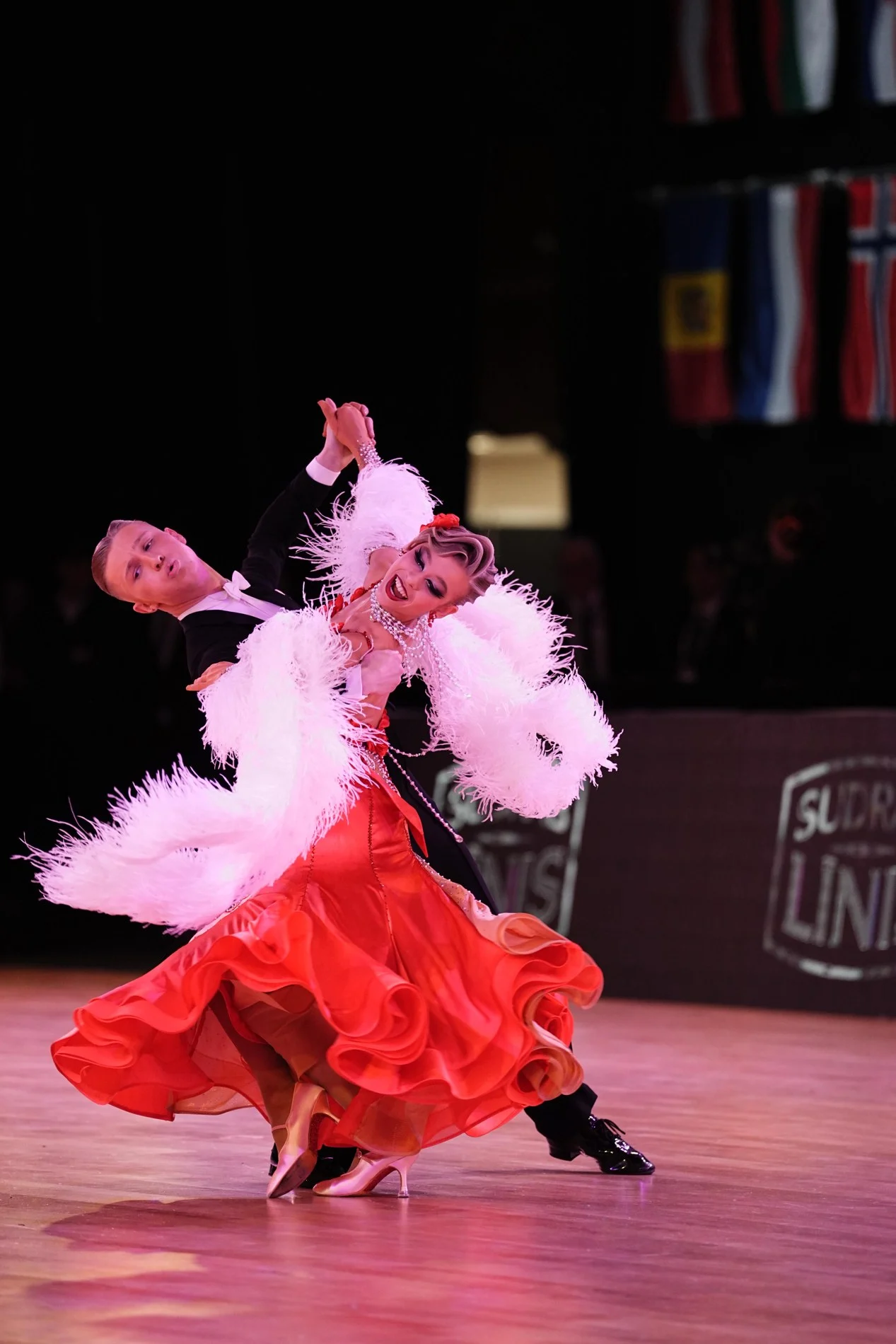 Ballroom dance couple on the competition floor